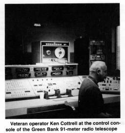 Veteran operator Ken Cottrell at the control console of the Green Bank 91-meter radio telescope