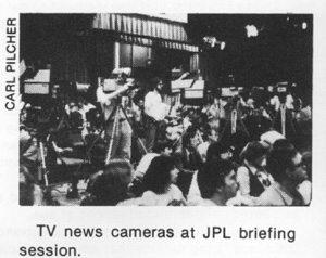 TV news cameras at JPL briefing session.
